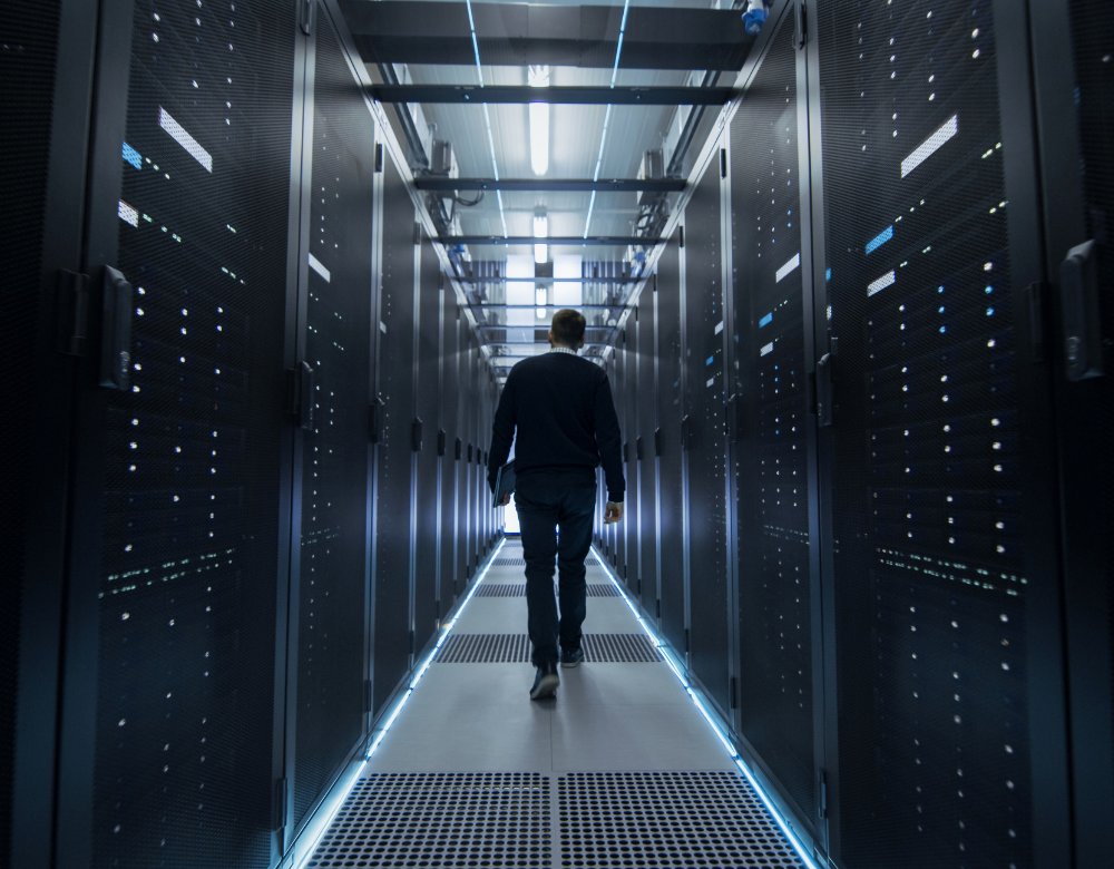 A man walks in data centre generators